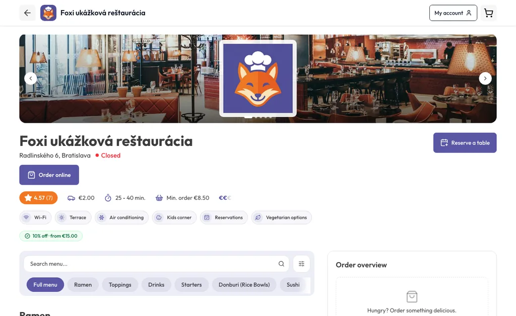 Zobrazenie webu reštaurácie postaveného na Foxi.food na počítači: úvodné fotografie, otváracie hodiny, tlačidlo Objednať online a menu
